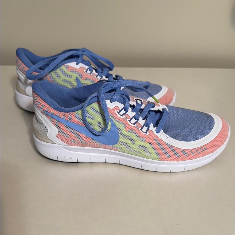 Nike Blue and Pink Athletic Shoes with Mesh Design